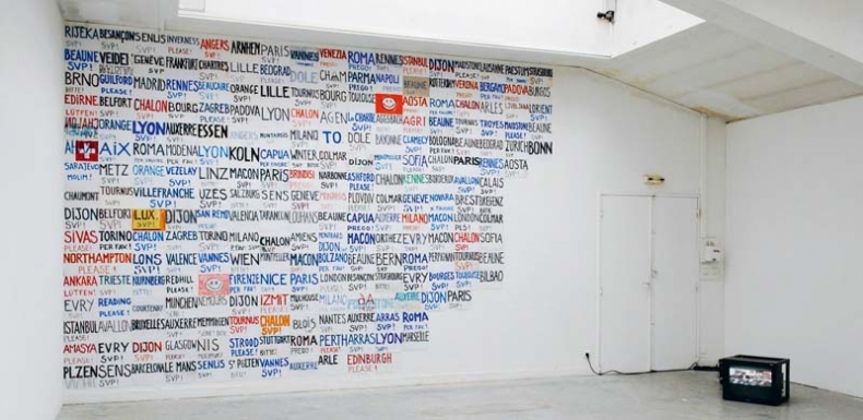 Signs, installation view, ENSA Dijon, 2010, work in progress (used hitchhiking signs on A4 paper on wall)
